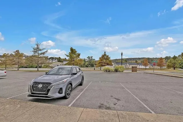 a view of multiple houses with a street