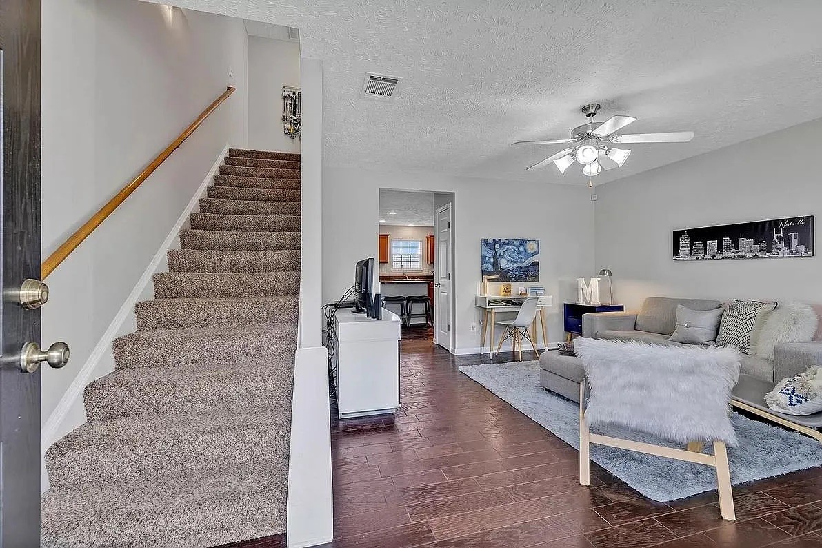 1504 Sprucedale Drive Antioch, TN 37013 - Photo 5 of 30 a living room with furniture and wooden floor