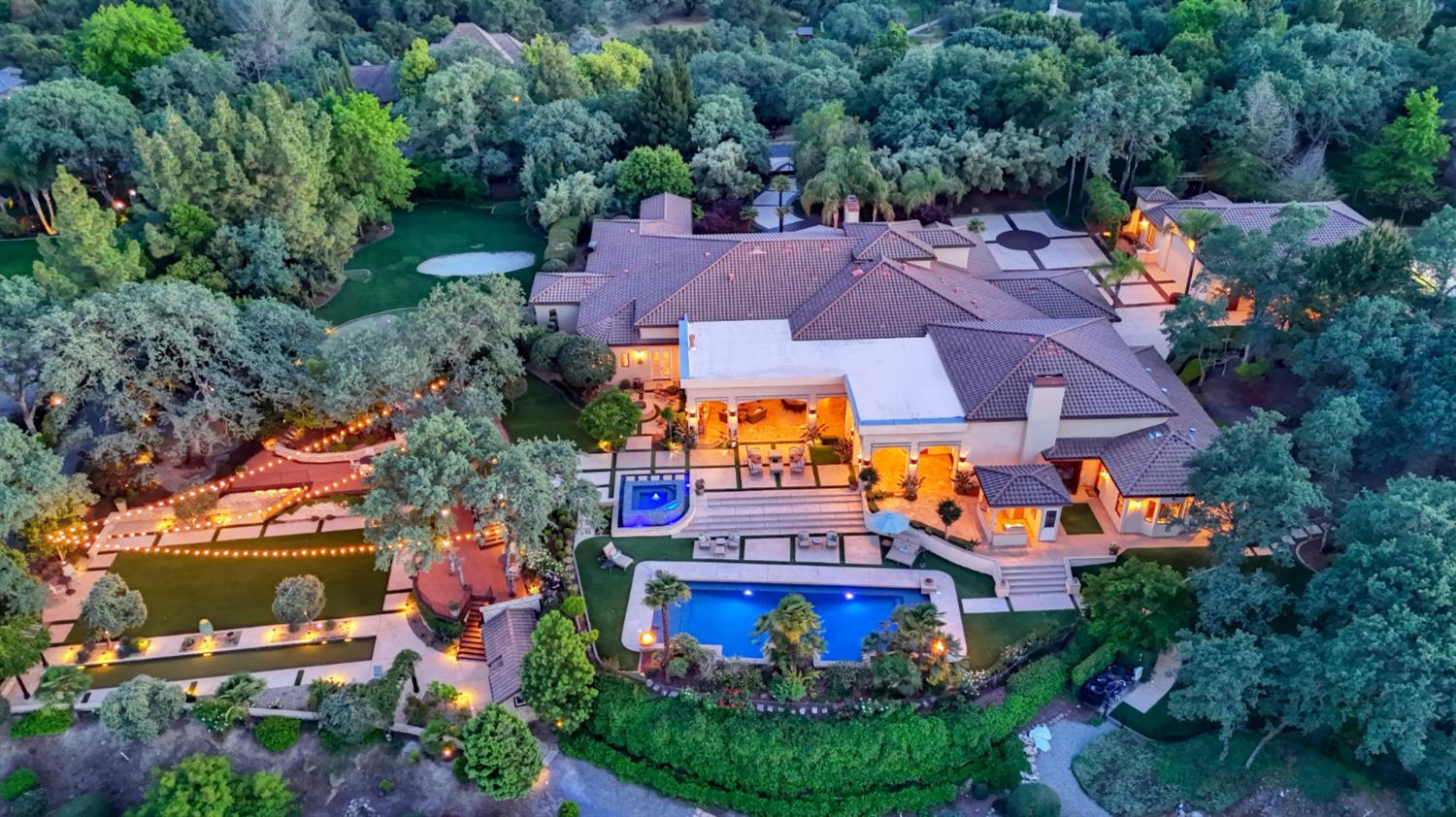 5687 Ridge Park Drive Loomis, CA 95650 - Photo 1 of 97 an aerial view of a house with a swimming pool outdoor seating and yard