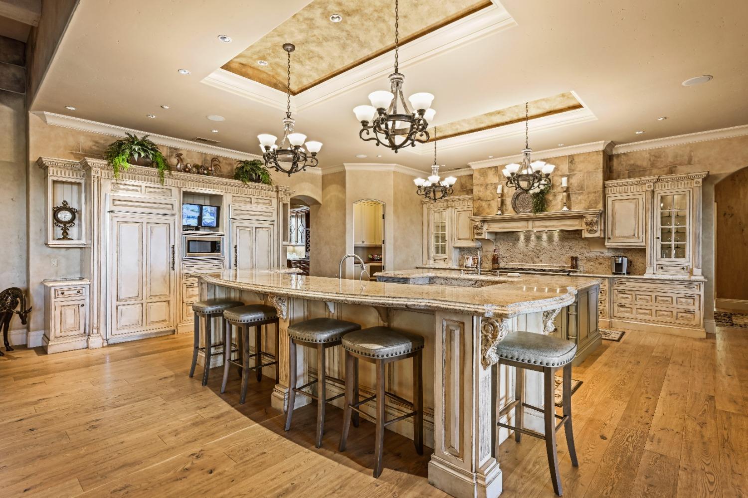 5687 Ridge Park Drive Loomis, CA 95650 - Photo 14 of 79 a kitchen with a table and chairs in it