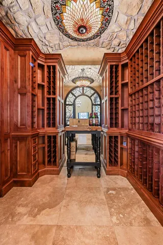 a view of a house with swimming pool and sitting area