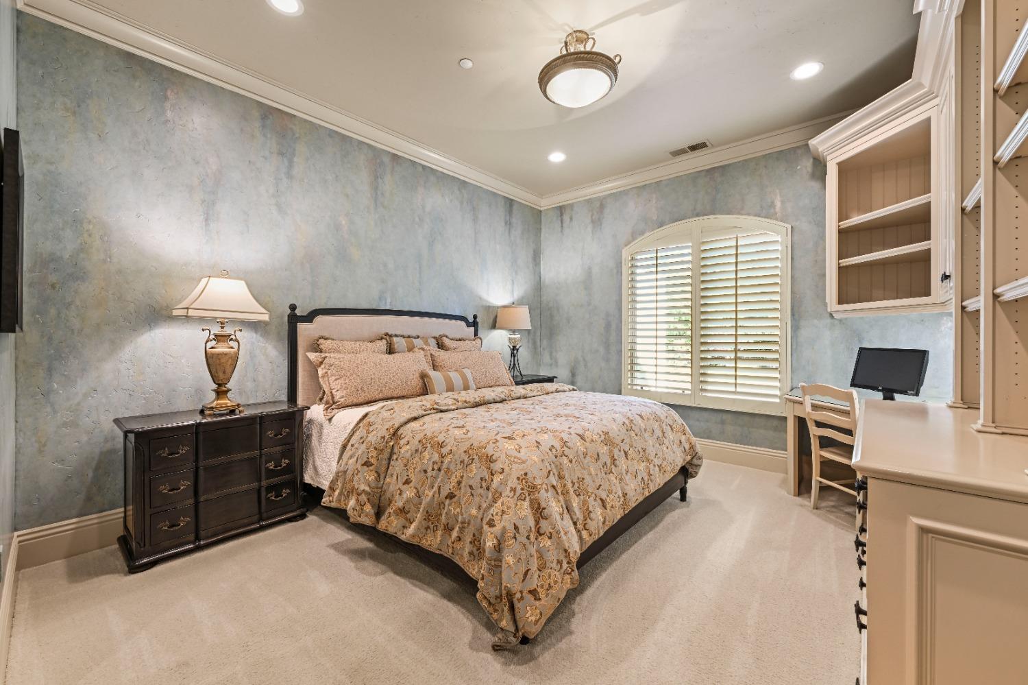 5687 Ridge Park Drive Loomis, CA 95650 - Photo 26 of 79 a large bed sitting in a room next to a window