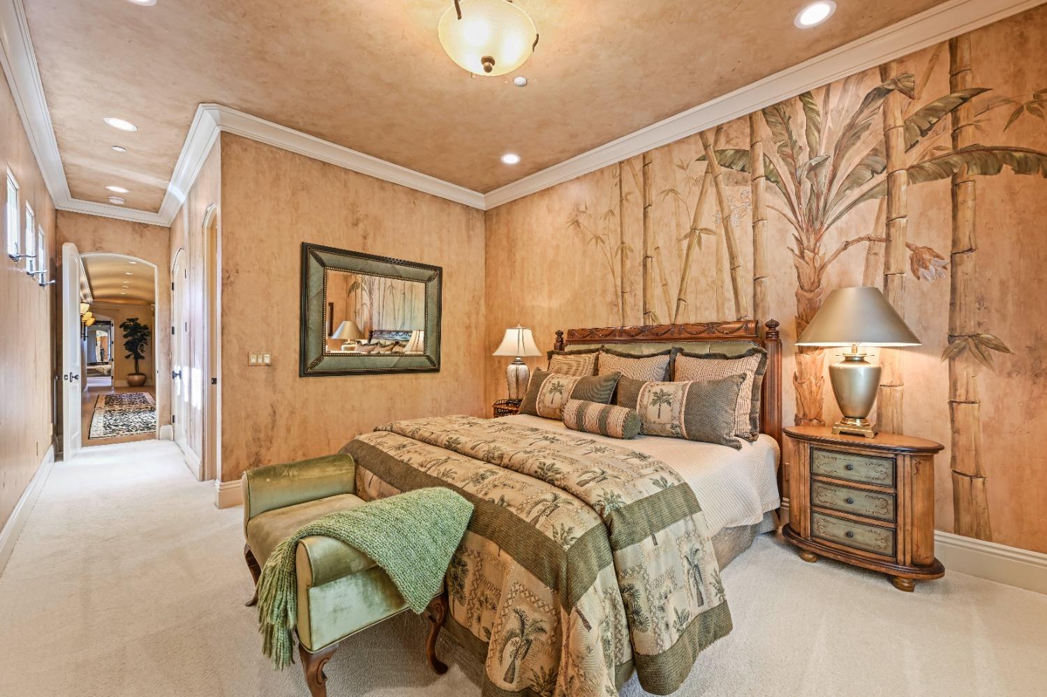 5687 Ridge Park Drive Loomis, CA 95650 - Photo 30 of 79 a bedroom with a bed mirror and a walk in closet