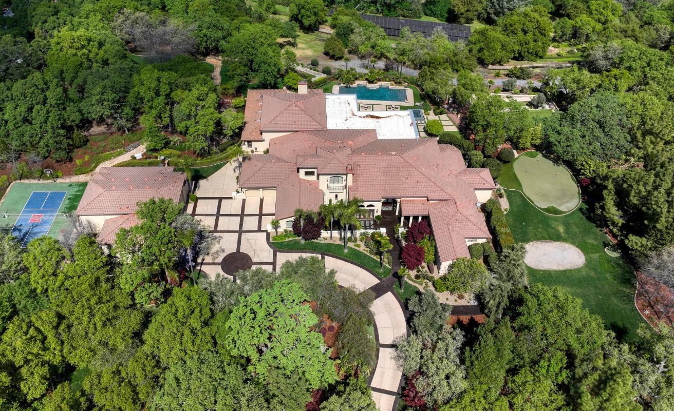 5687 Ridge Park Drive Loomis, CA 95650 - Photo 3 of 79 an aerial view of a house with a yard and lake view