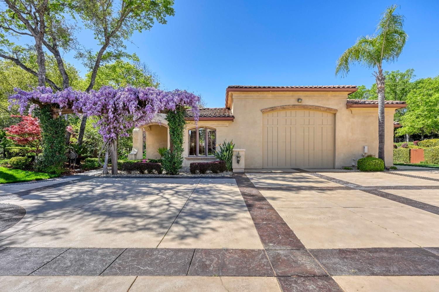 5687 Ridge Park Drive Loomis, CA 95650 - Photo 46 of 79 a front view of a house with a yard and a garage