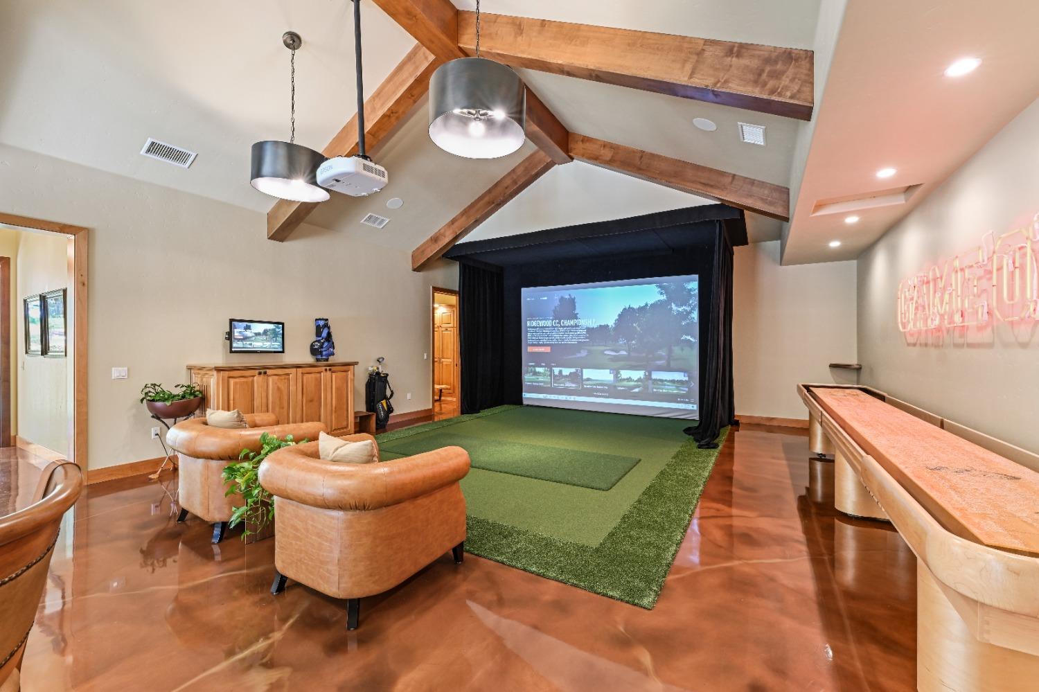 5687 Ridge Park Drive Loomis, CA 95650 - Photo 52 of 79 a living room with furniture and a flat screen tv
