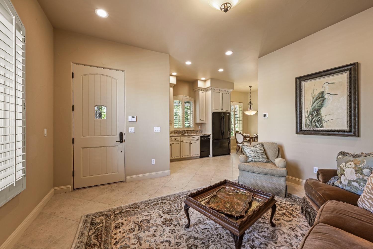 5687 Ridge Park Drive Loomis, CA 95650 - Photo 55 of 79 a living room with furniture and a rug