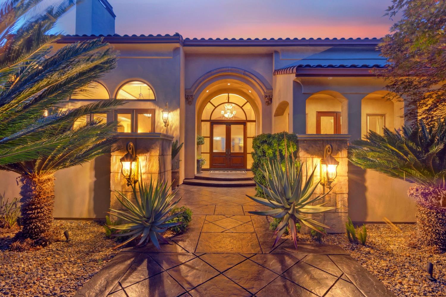 5687 Ridge Park Drive Loomis, CA 95650 - Photo 6 of 97 a front view of a house with garden