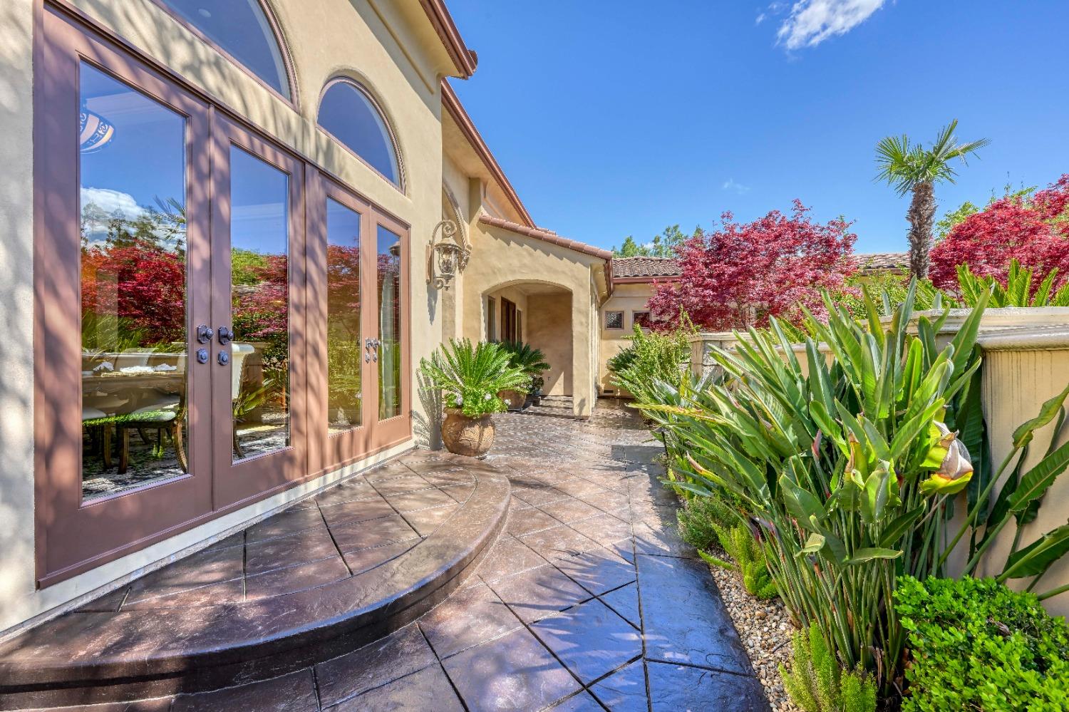 5687 Ridge Park Drive Loomis, CA 95650 - Photo 6 of 79 a front view of a house with a porch