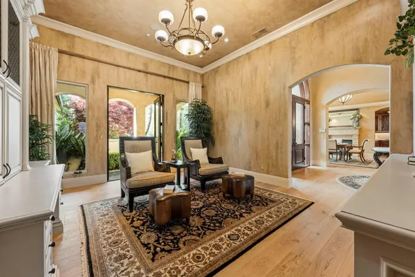 a kitchen with a table and chairs in it