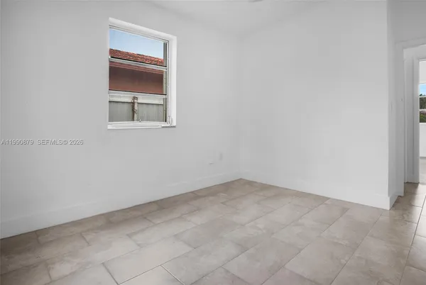 an empty room with a window
