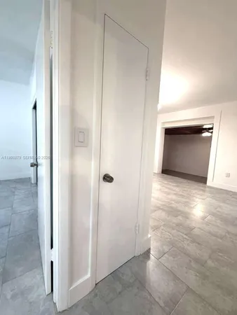 an empty room with an entryway
