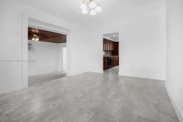 an empty room with a bathroom