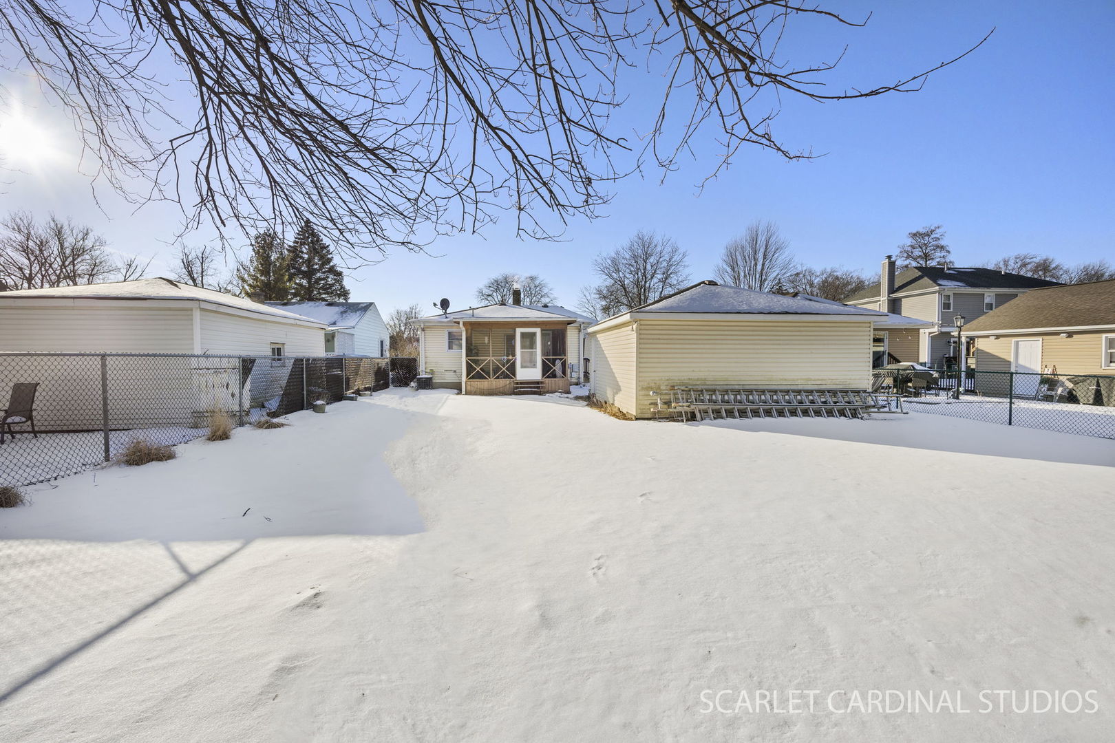 543 South Chase Avenue Lombard, IL 60148 - Photo 16 of 16 a view of a house with a snow in the yard