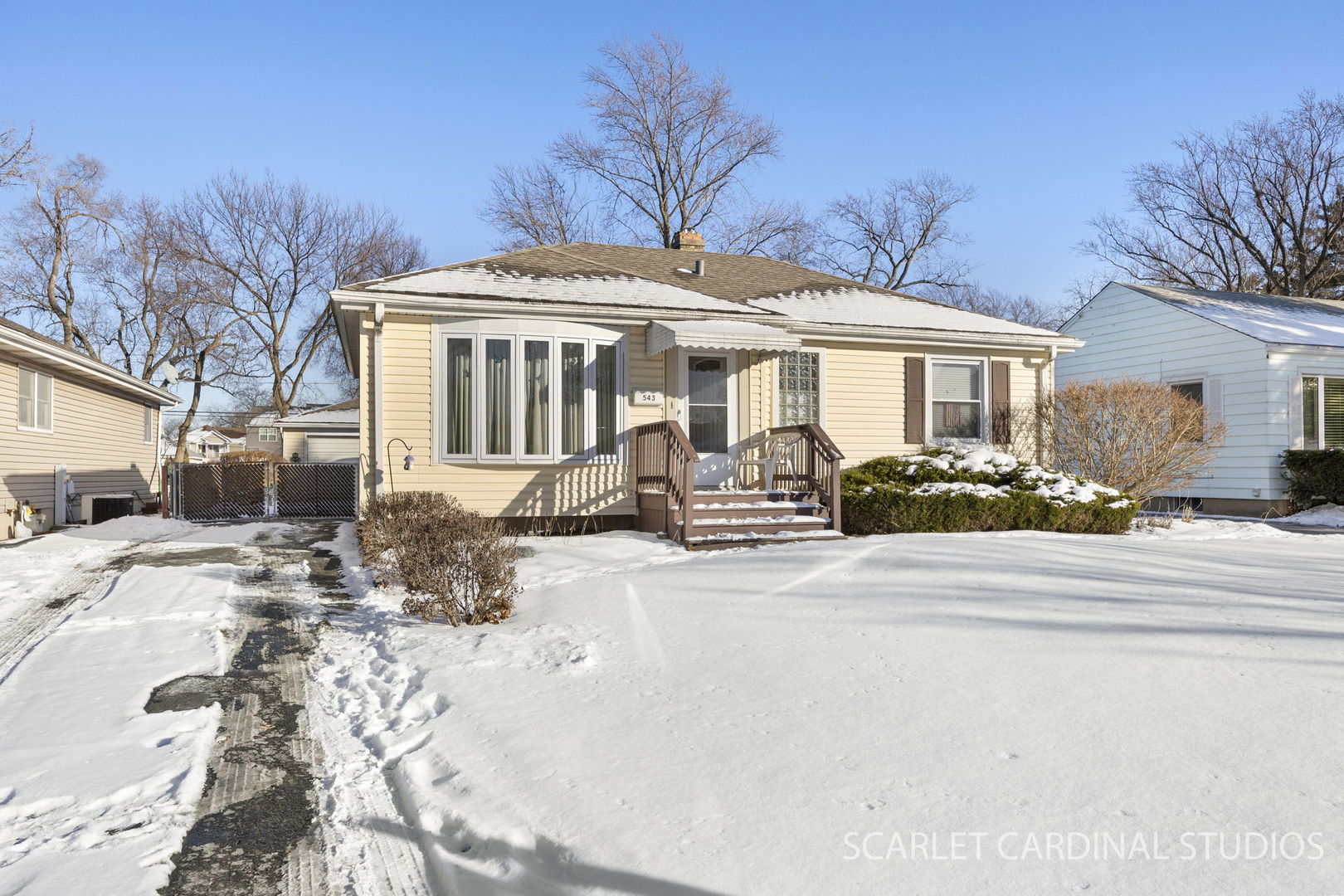 543 South Chase Avenue Lombard, IL 60148 - Photo 2 of 16 a front view of a house with a yard