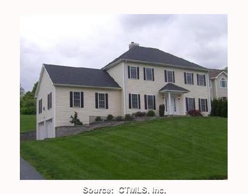 153 Old Farms East Road Middletown, CT 06457 - Photo 1 of 1 a front view of a house with a garden and yard