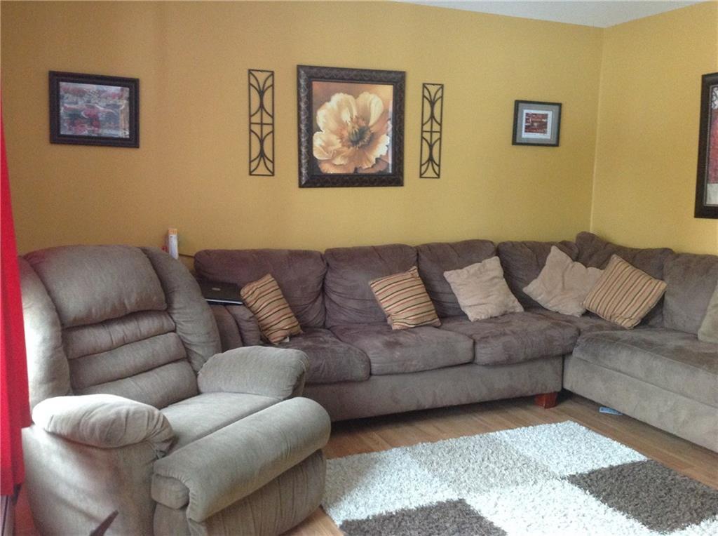 7 Benjamin Lane Morrill, ME 04952 - Photo 12 of 20 Warm and cozy living room says "...