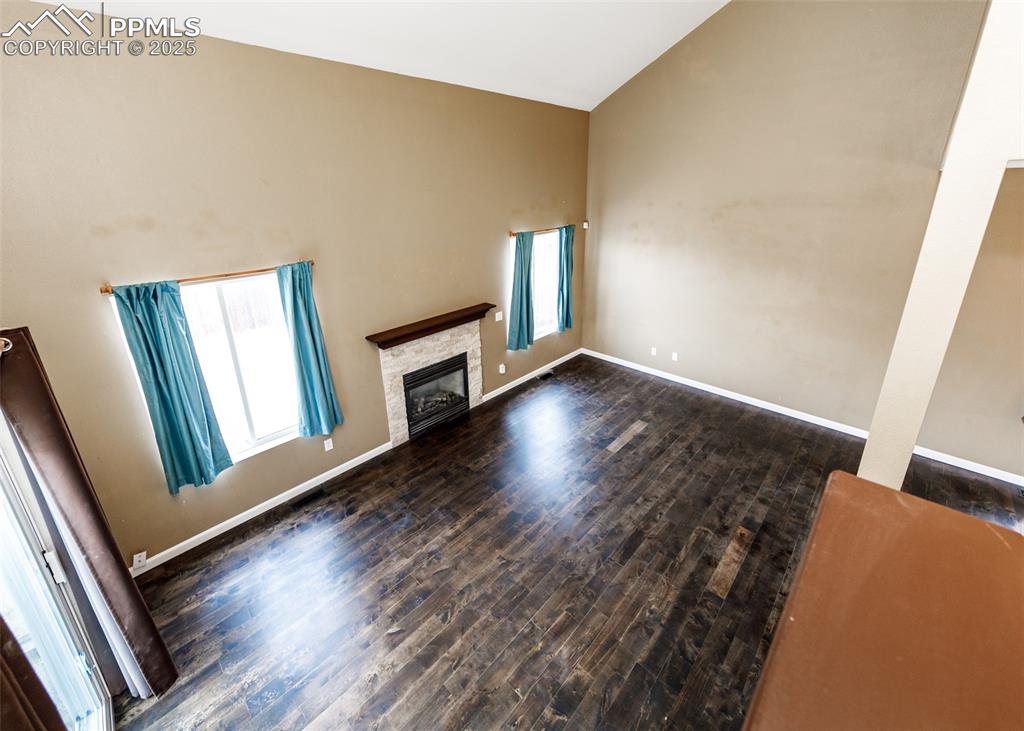 8119 Oliver Road Peyton, CO 80831 - Photo 14 of 38 a view of a livingroom with wooden floor