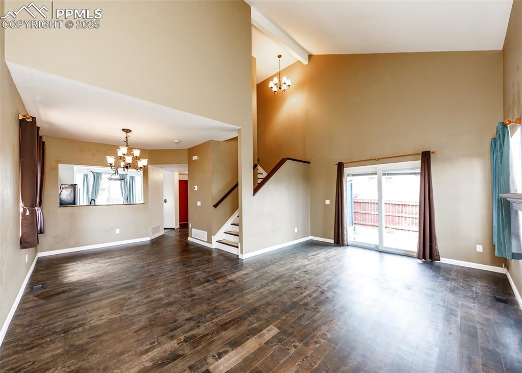 8119 Oliver Road Peyton, CO 80831 - Photo 10 of 38 wooden floor in an empty room with a window