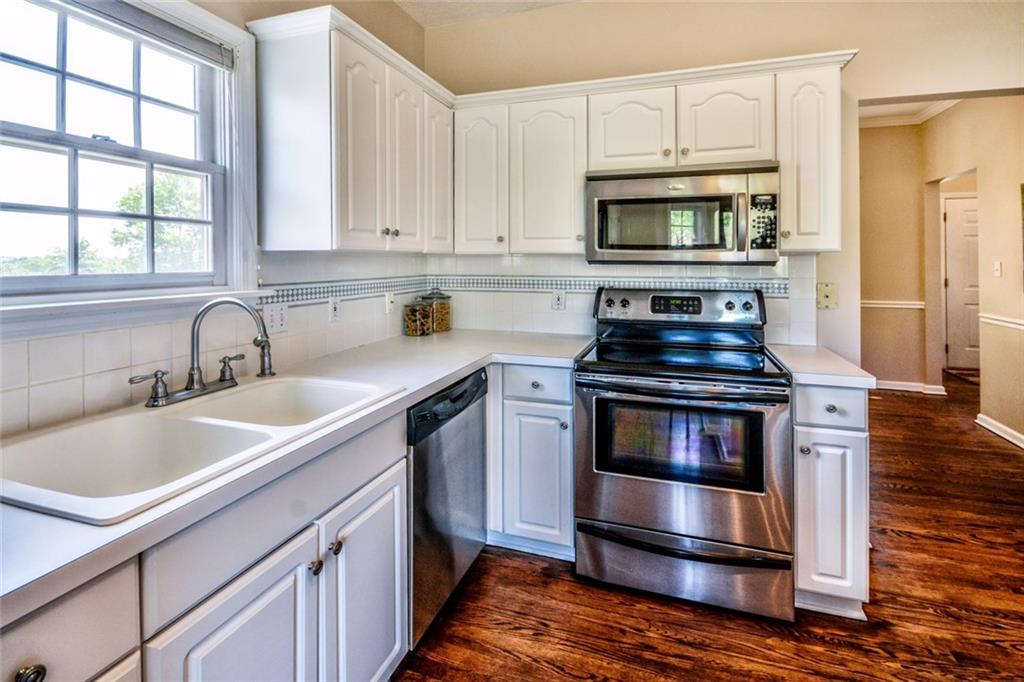 7005 Eagle Road Gibsonia, PA 15044 - Photo 9 of 25 Whirlpool Microwave, GE Dishwasher, Frigidare Electric Stove. 16x16