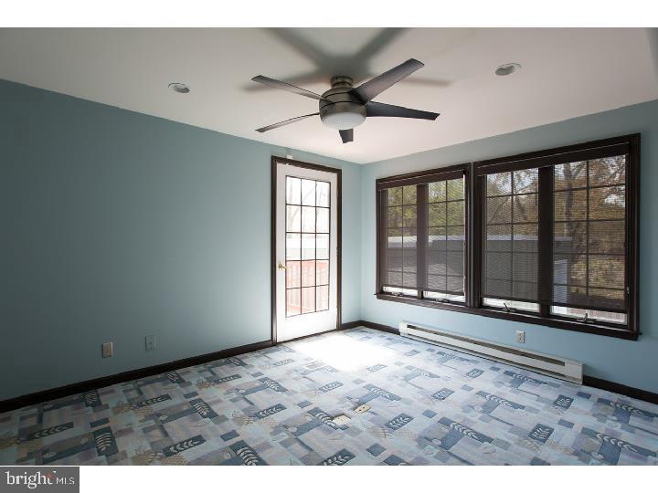35 Beulah Road Doylestown, PA 18901 - Photo 12 of 41 a view of an empty room with a window