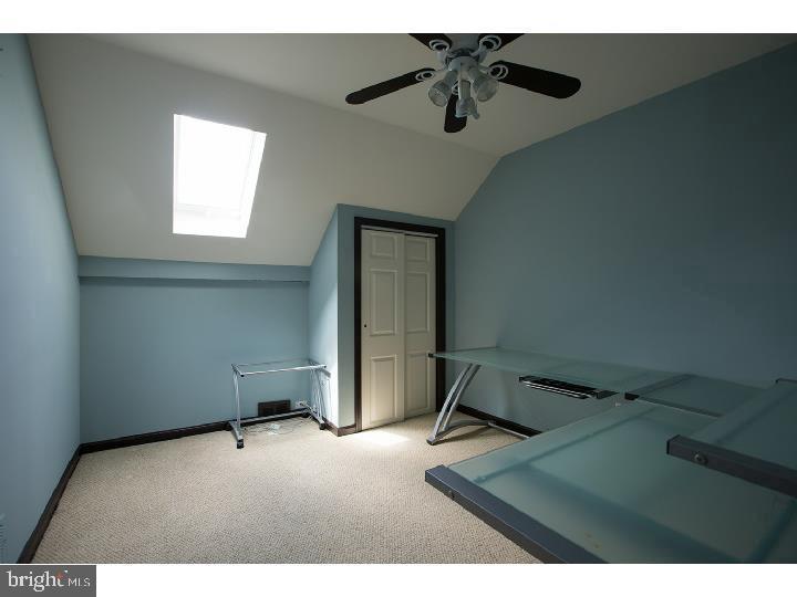 35 Beulah Road Doylestown, PA 18901 - Photo 16 of 41 a room with gym equipment and a window