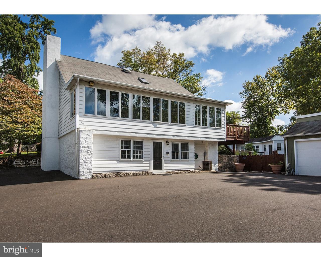 35 Beulah Road Doylestown, PA 18901 - Photo 2 of 41 a front view of a building with lot of trees