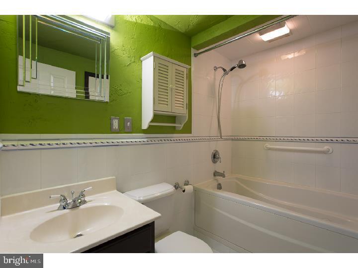 35 Beulah Road Doylestown, PA 18901 - Photo 40 of 41 a bathroom with a sink and a mirror