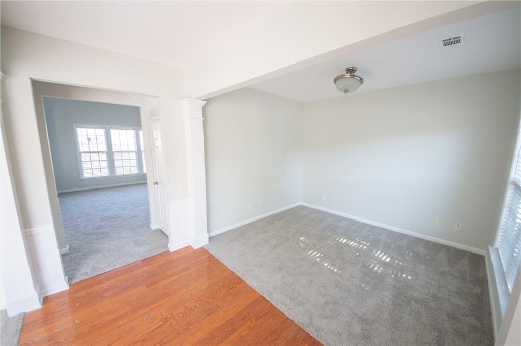 8145 Lockslay Way Suwanee, GA 30024 - Photo 10 of 18 a view of empty room