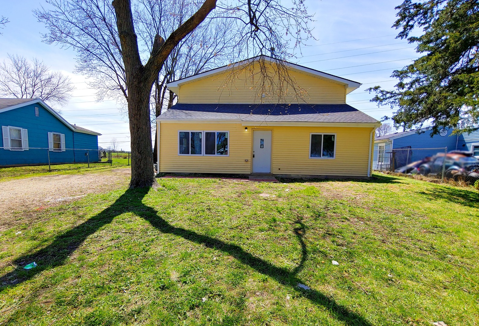 120 Edison Road Joliet, IL 60433 - Photo 1 of 21 a front view of house with yard and trees around