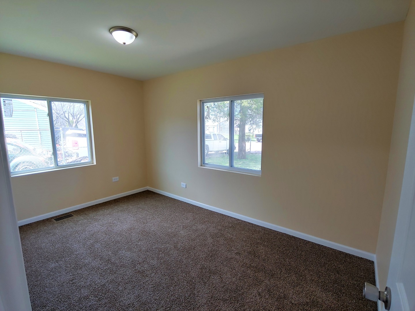 120 Edison Road Joliet, IL 60433 - Photo 14 of 21 an empty room with windows