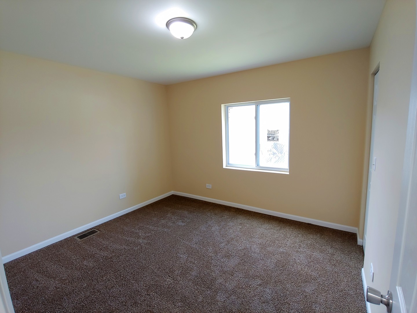 120 Edison Road Joliet, IL 60433 - Photo 15 of 21 an empty room with a window