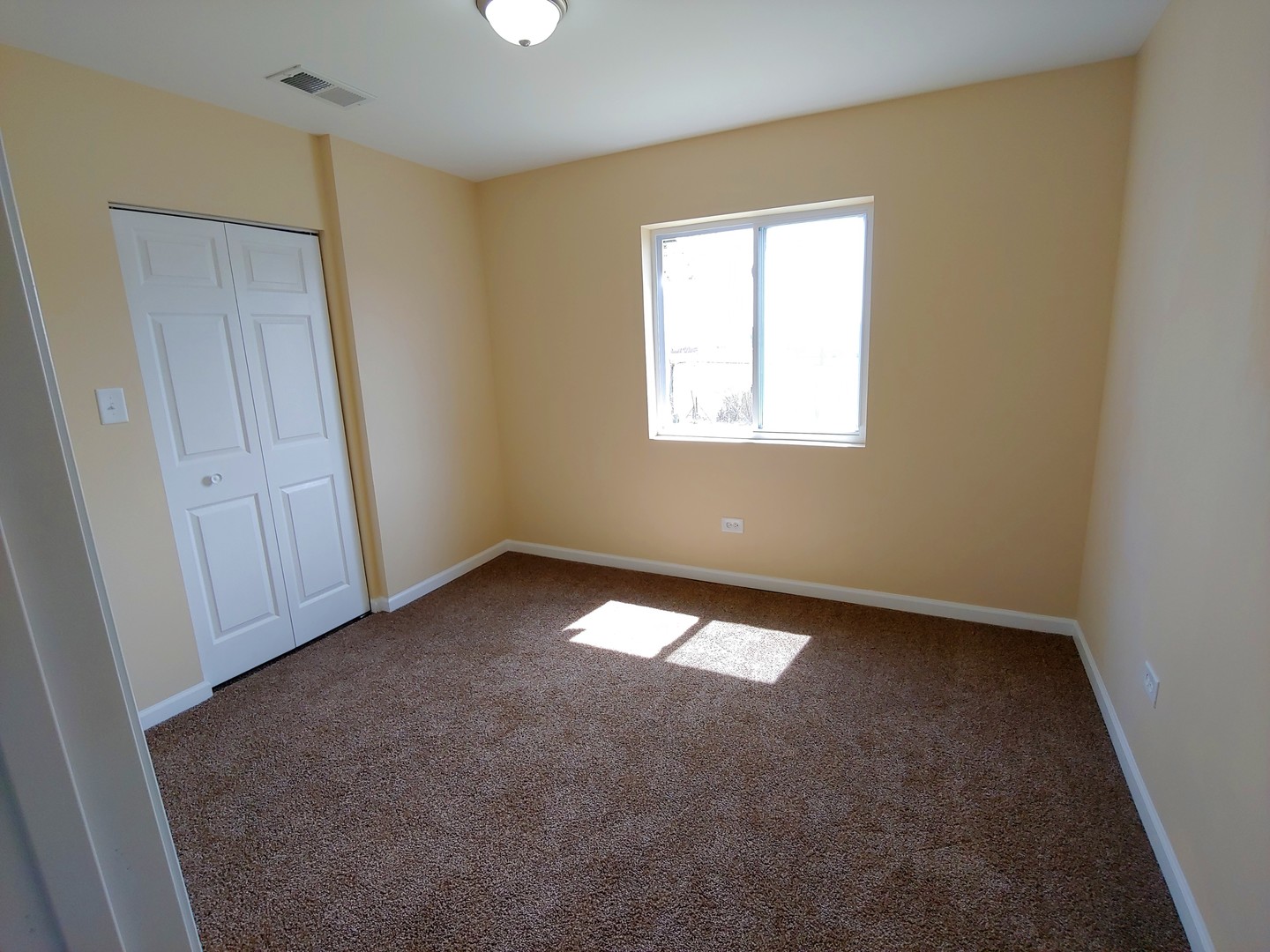 120 Edison Road Joliet, IL 60433 - Photo 19 of 21 an empty room with a window