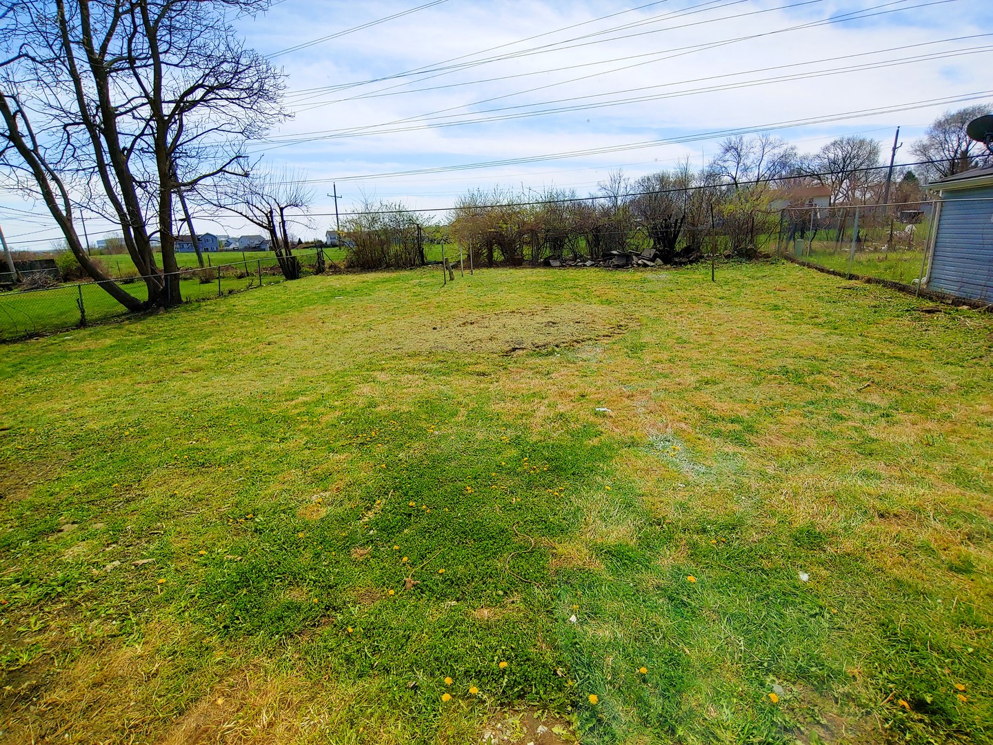 120 Edison Road Joliet, IL 60433 - Photo 20 of 21 a view of an outdoor space and a yard