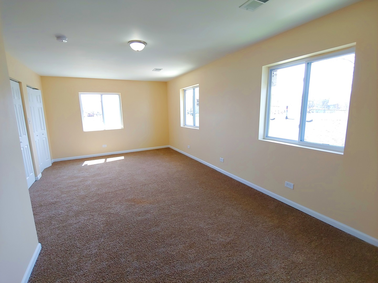 120 Edison Road Joliet, IL 60433 - Photo 9 of 21 an empty room with windows