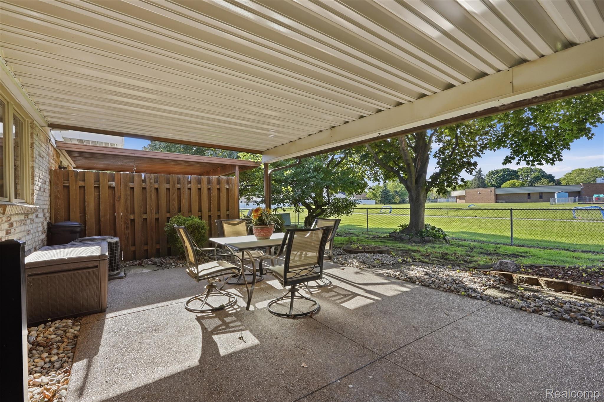 18160 Raleigh Square Drive Southgate, MI 48195 - Photo 26 of 31 Covered concrete patio featuring a metal awning