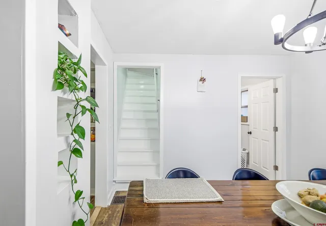 a view of entryway with wooden floor