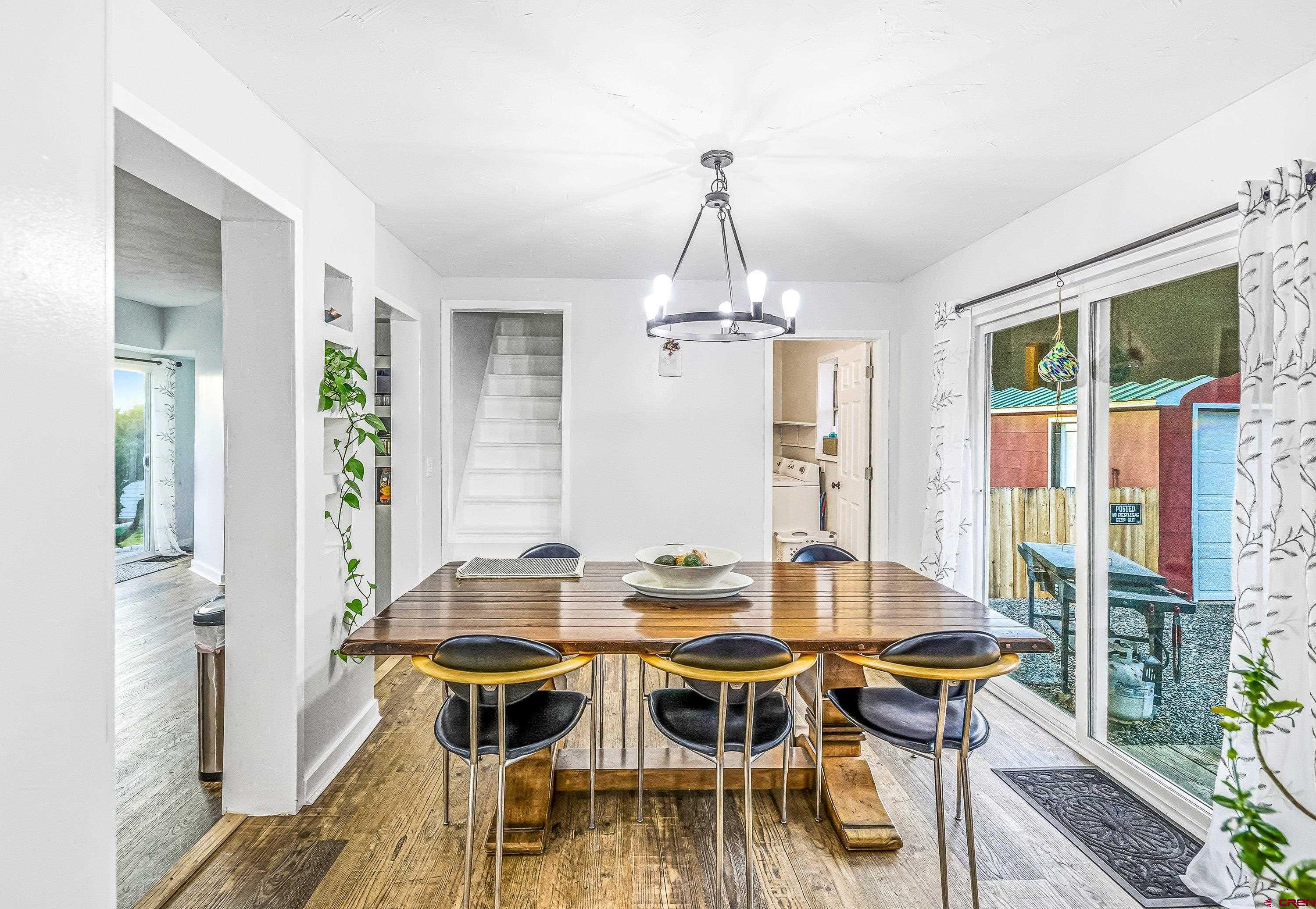249 Park Street Delta, CO 81416 - Photo 3 of 22 a view of a dining room with furniture window and outside view