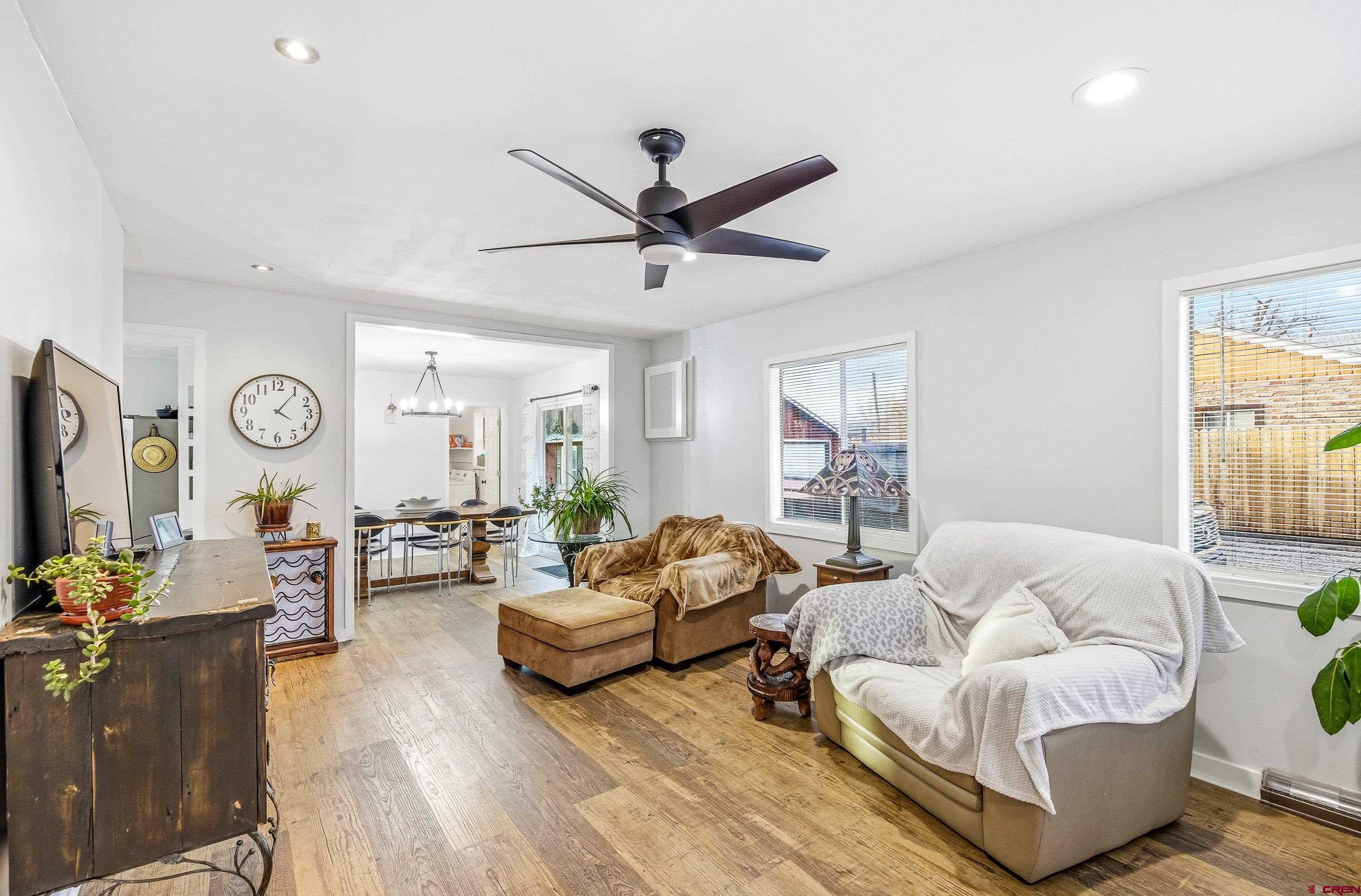 249 Park Street Delta, CO 81416 - Photo 9 of 22 a living room with furniture or couch and a flat screen tv