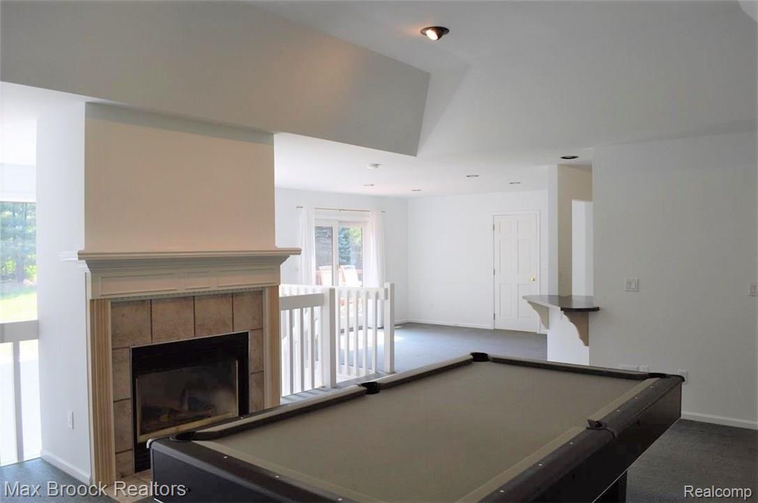 10240 Washburn Road Goodrich, MI 48438 - Photo 14 of 39 Gas FP, tray ceiling and recessed lighting in the living room