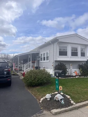 a house view with a garden space