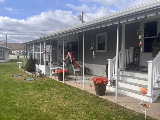 a view of a house with a park