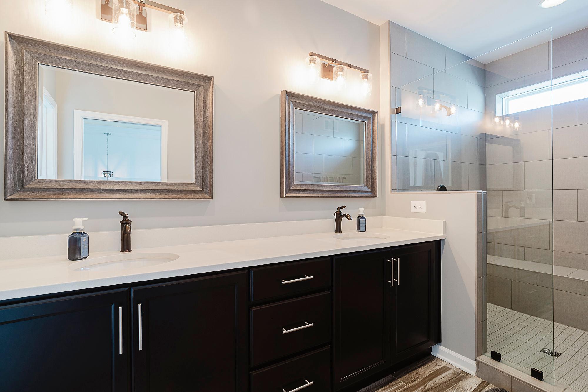 834 Lindley Road Frederick, MD 21701 - Photo 63 of 79 Primary bath with double sinks & framed mirrors