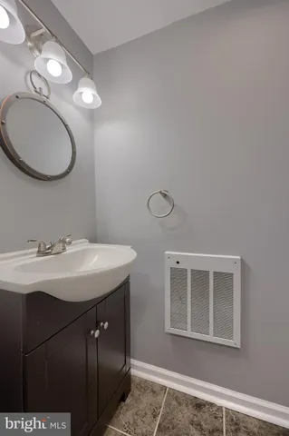 a view of a wooden deck with a yard