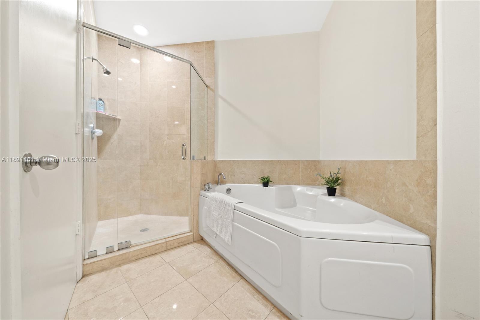 848 Brickell Key Drive, Unit 201 Miami, FL 33131 - Photo 15 of 31 a view of bathroom with dual sinks