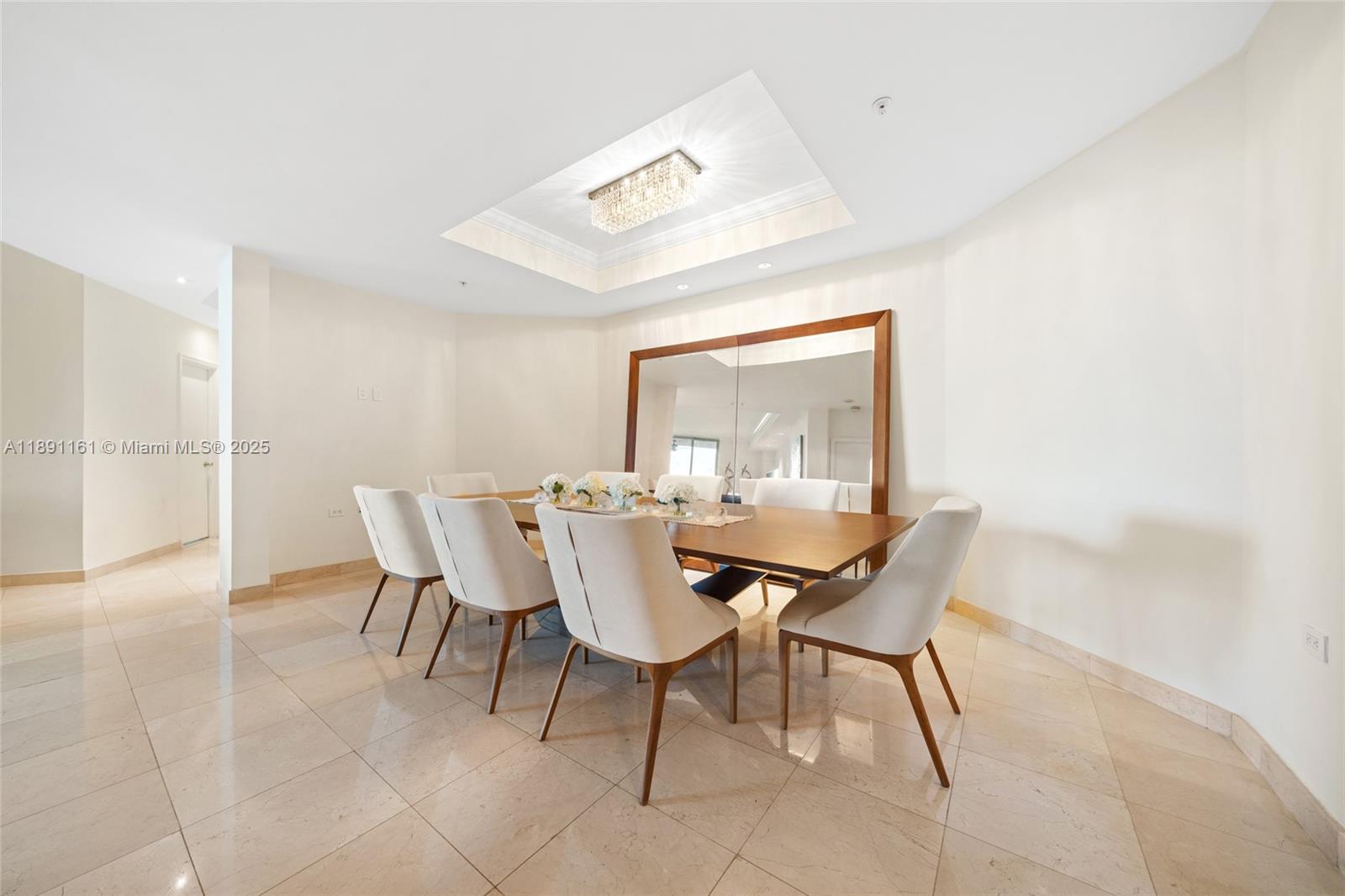 848 Brickell Key Drive, Unit 201 Miami, FL 33131 - Photo 28 of 31 a dining room with furniture and window