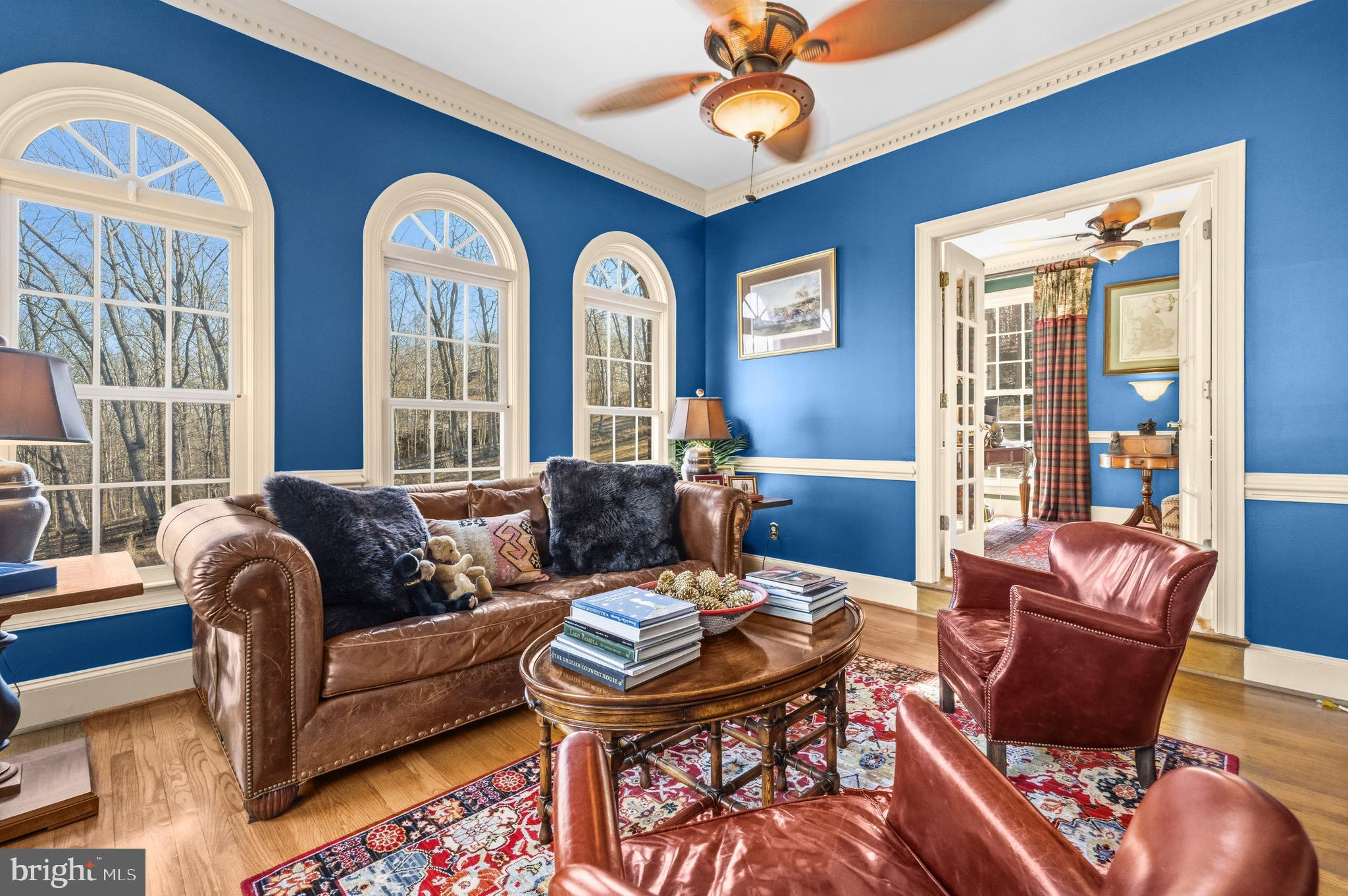 4514 Den Haag Road Warrenton, VA 20187 - Photo 11 of 67 a living room with furniture a table and a large window