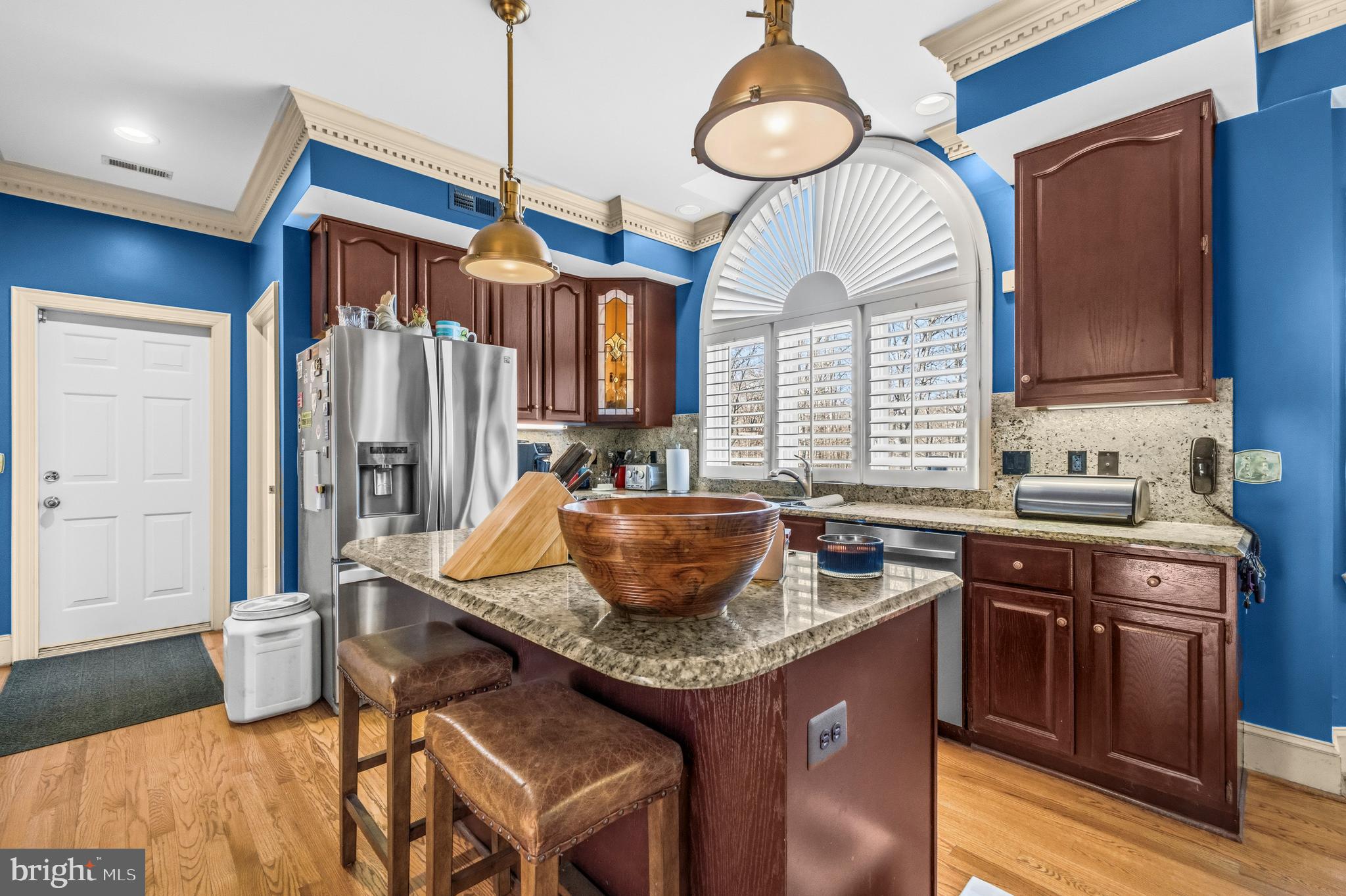 4514 Den Haag Road Warrenton, VA 20187 - Photo 16 of 56 a kitchen with granite countertop a sink a counter space and stainless steel appliances