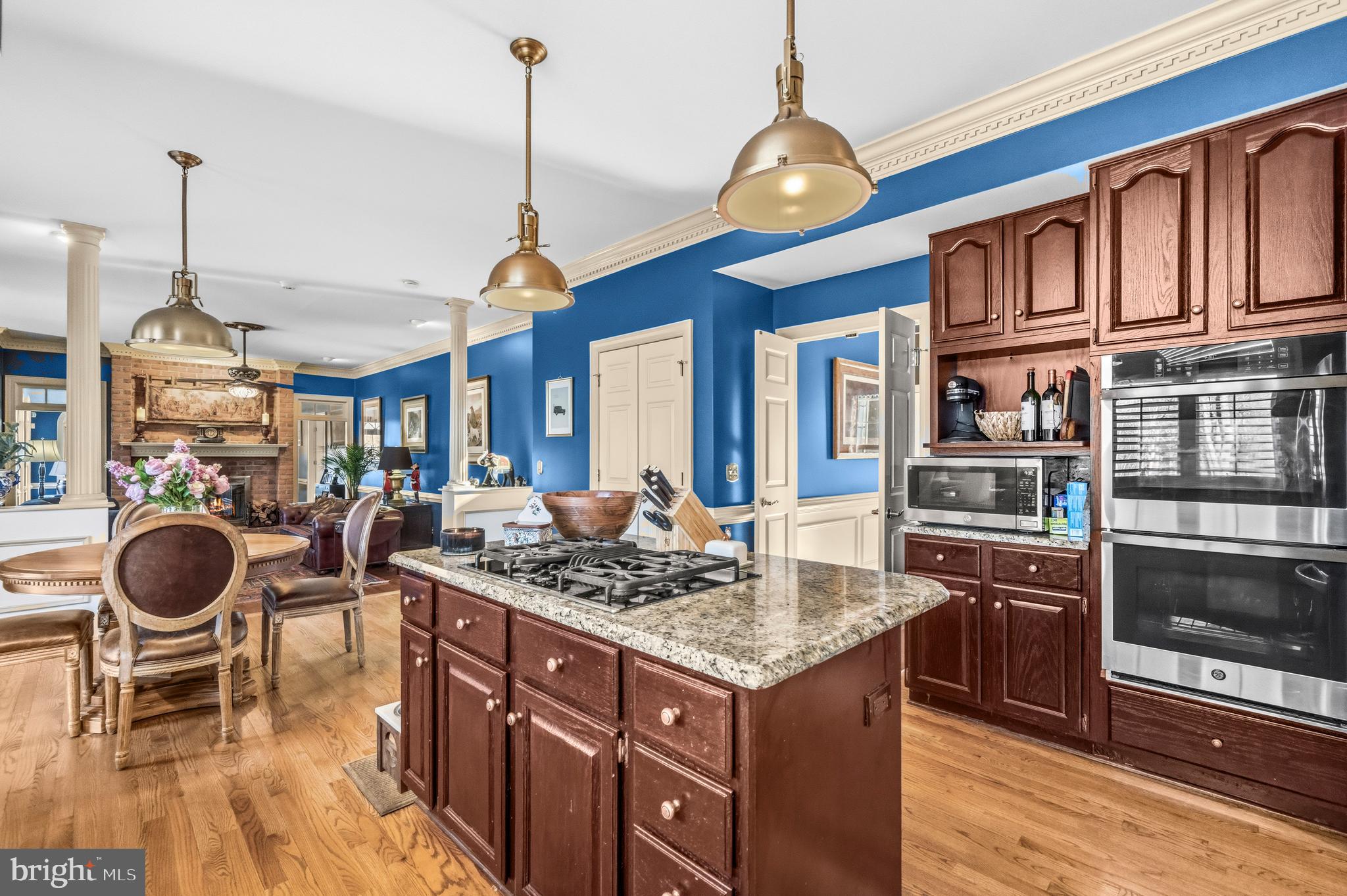4514 Den Haag Road Warrenton, VA 20187 - Photo 18 of 56 a very nice looking kitchen with granite countertop stove and wooden floor