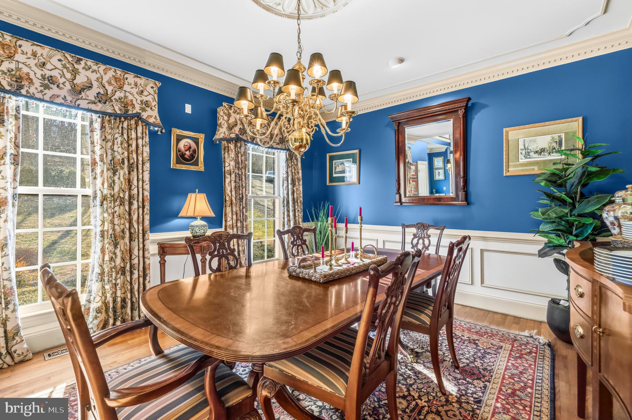 4514 Den Haag Road Warrenton, VA 20187 - Photo 19 of 56 a view of a dining room with furniture wooden floor and chandelier